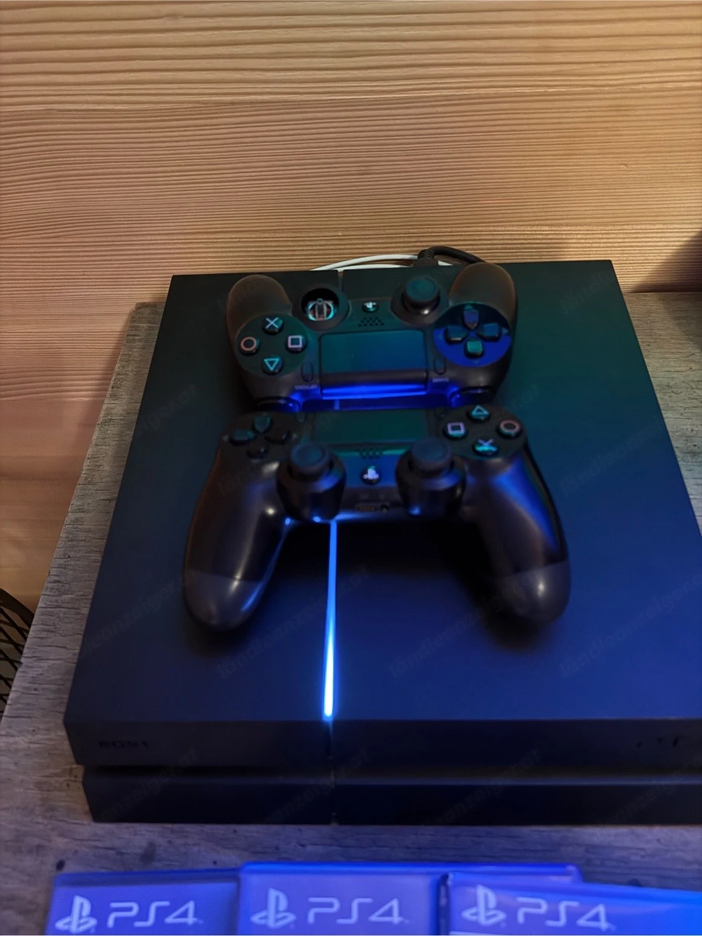 PS4 inkl. Spiele u Controller