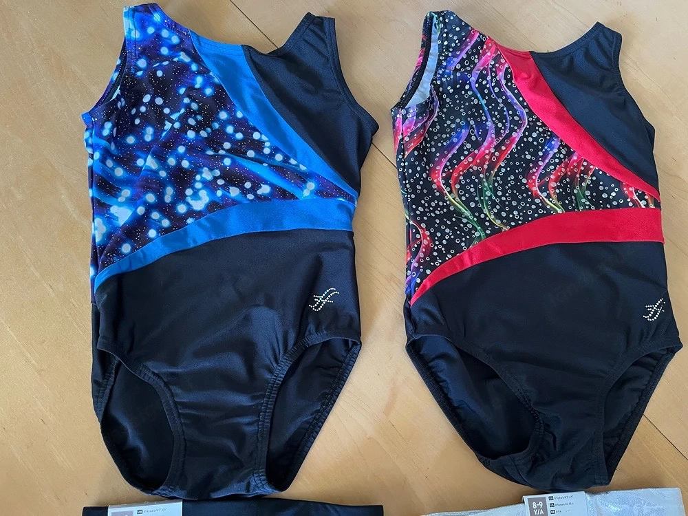 2 schöne Fischer Turnanzüge + 2 neue Turnpants Gr.134 140