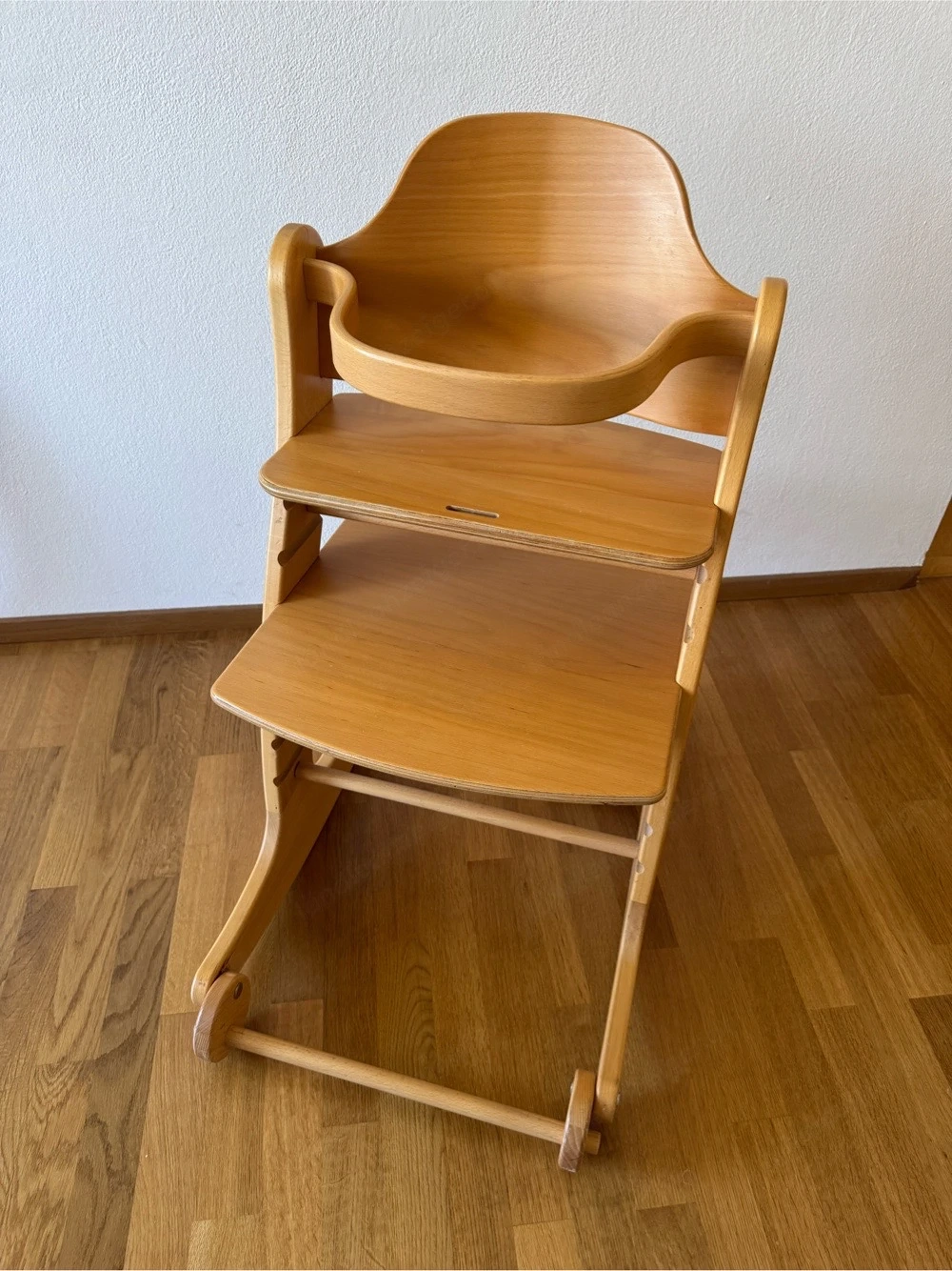 Kinderstuhl mit optionaler Schaukelfunktion