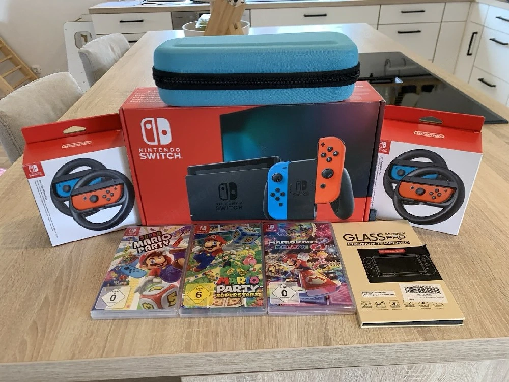 Nintendo Switch mit Zubehörpaket, 3 Spiele