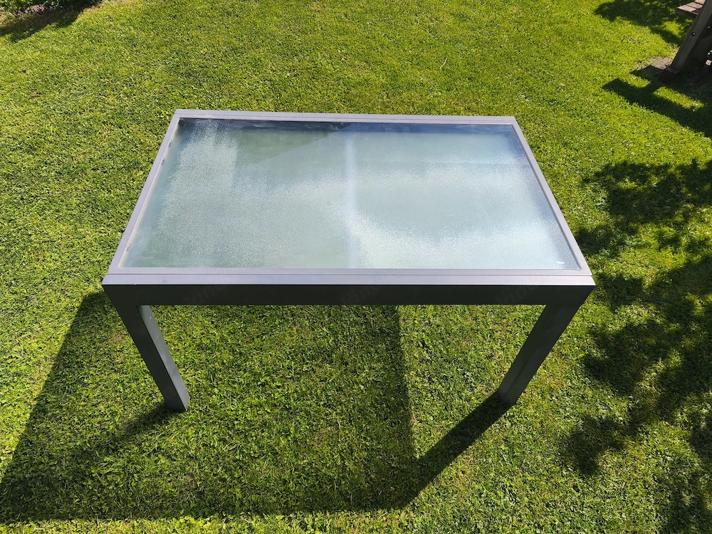Ausziehbarer Gartentisch aus Aluminium & Glas