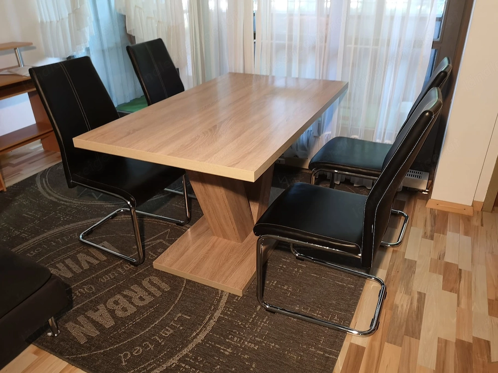 Esstisch mit 6 Leder-Schaukelstühlen