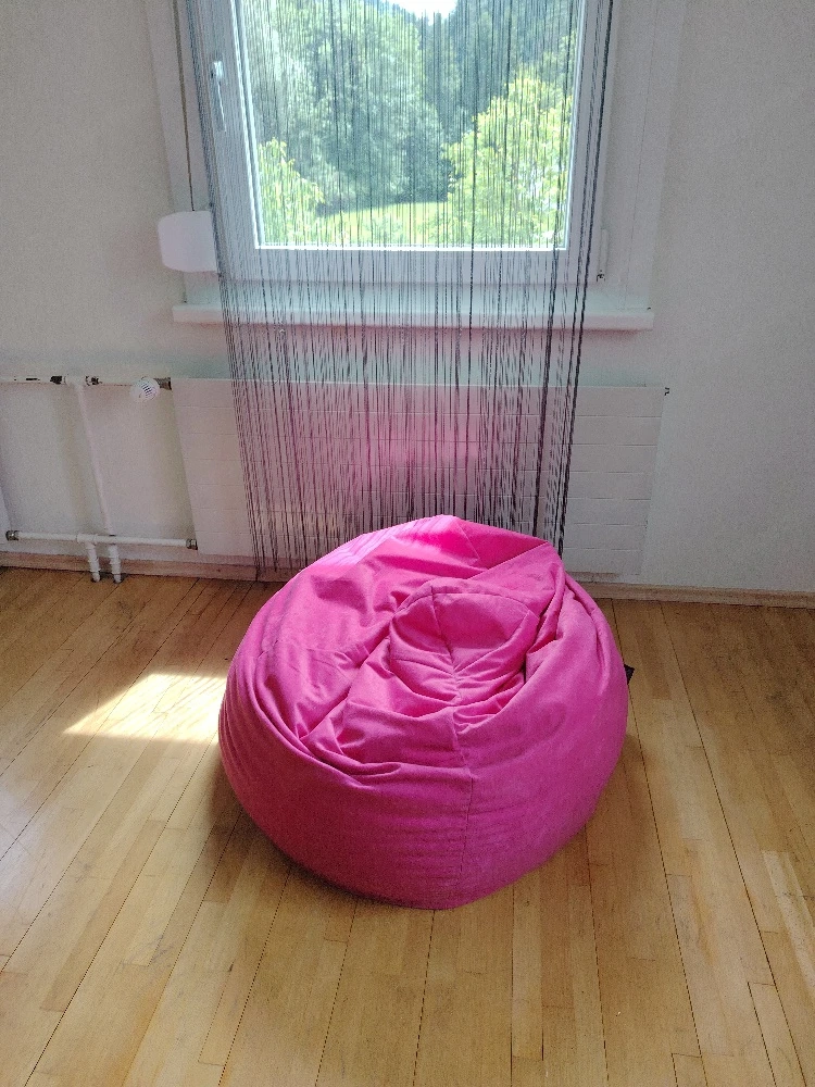 pinkes Sitzkissen zu verschenken 
