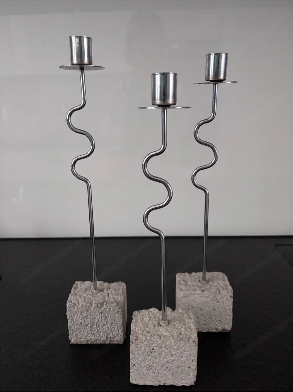 3 Leuchter mit Betonsockel