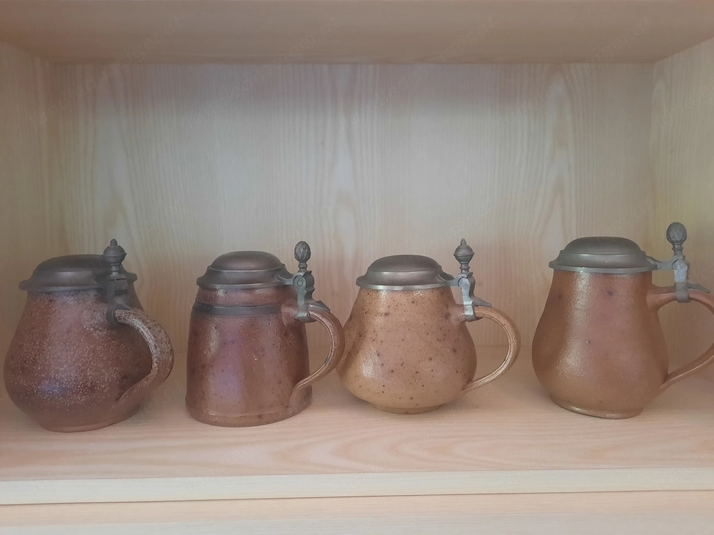 Bierkrug mit Zinndeckel