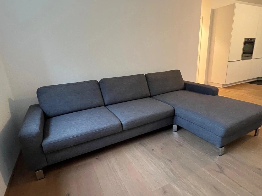 Graue L-Couch