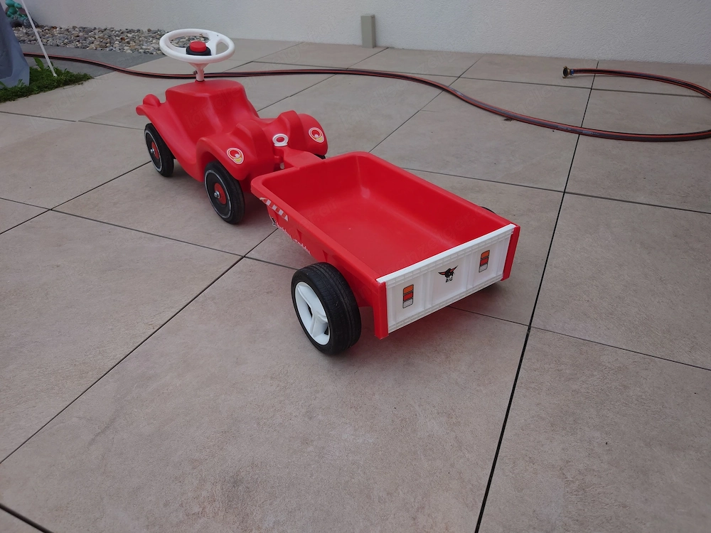 Bobby car mit Anhänger