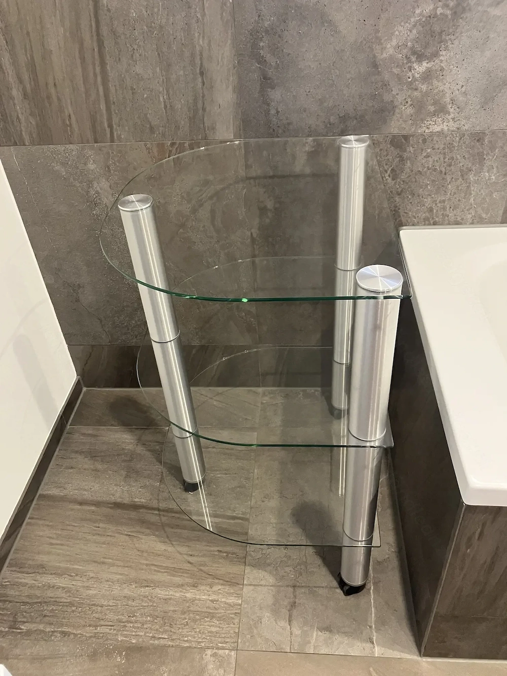 Glastisch chrom mit Rollen