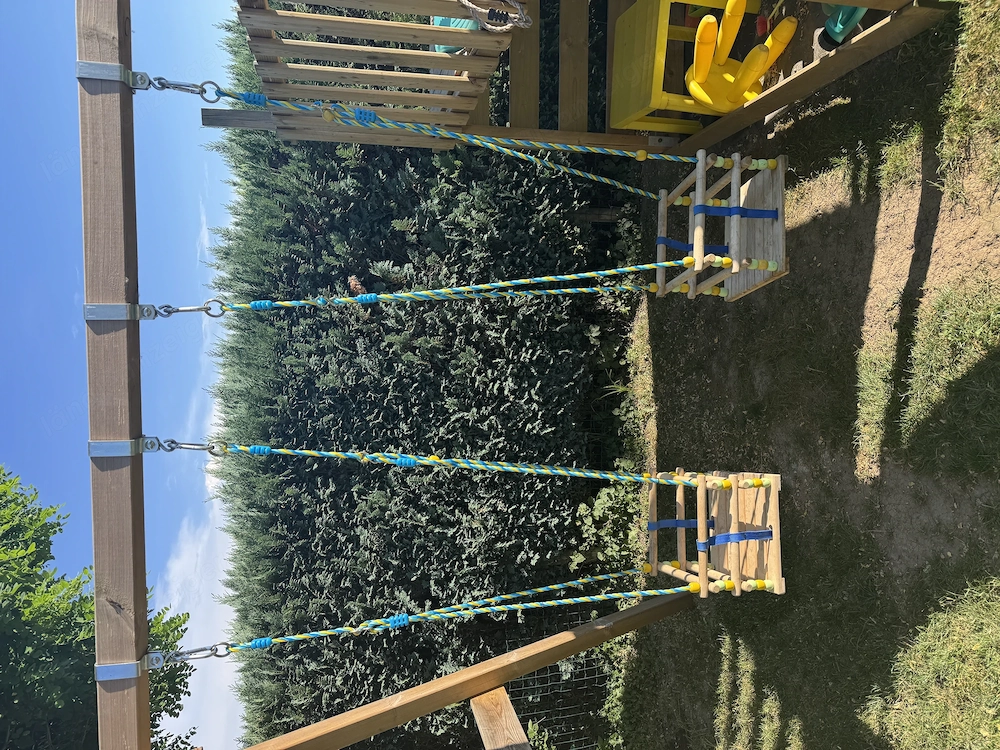 Babyschaukel aus Holz