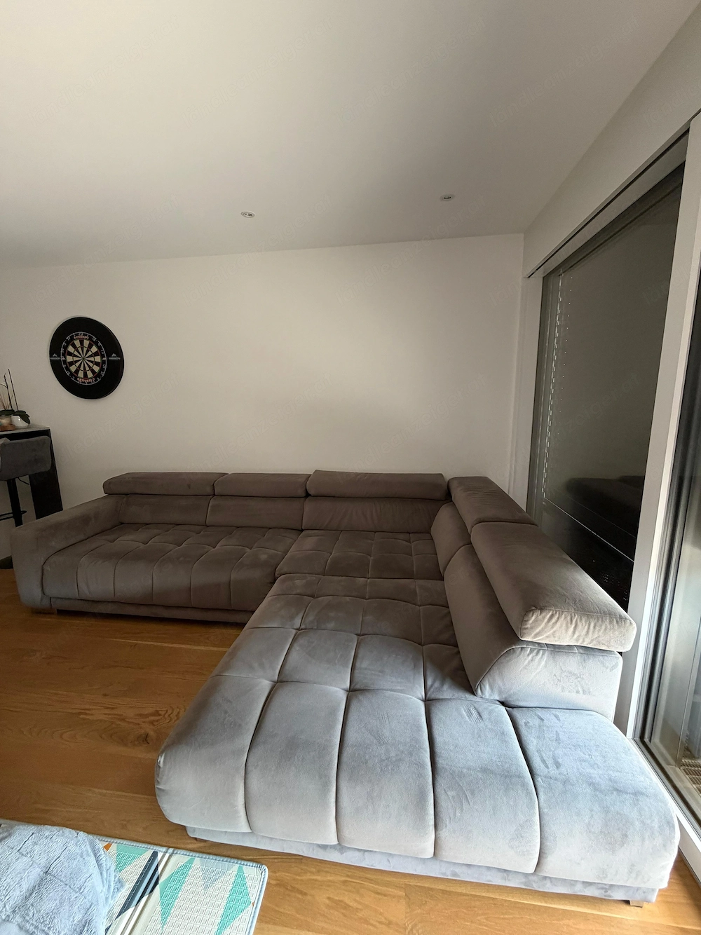 Ecksofa Cosana grau mit manueller Vorziehbank