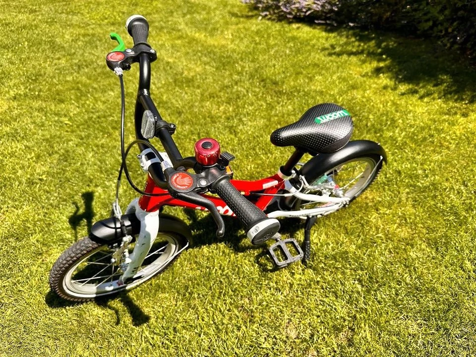 Woom 2 Kinderfahrrad rot 14 Zoll mit Zubehör 