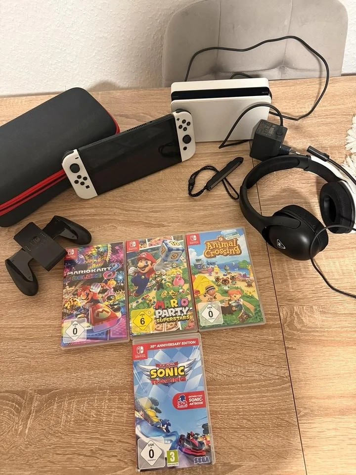 Nintendo Switch OLED Weiß mit Spielen 
