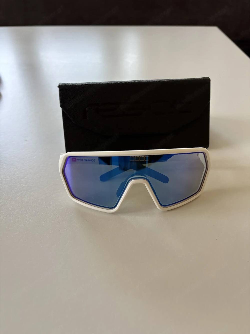 NEU react rev Sportbrille   selbsttönend   weiß   polarisiert