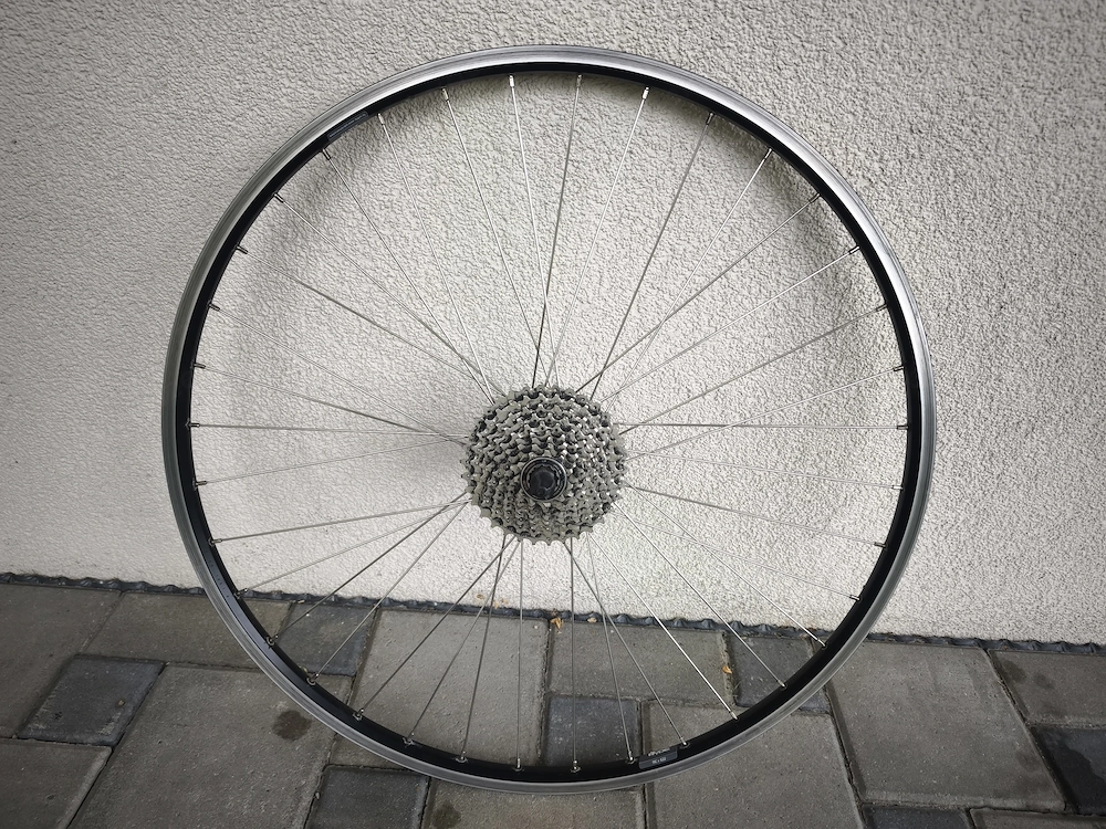 Hinterradfelge Fahrrad Laufrad V-Brake 9-fach 19cx622 28" inkl. Shimano Deore Kassette 