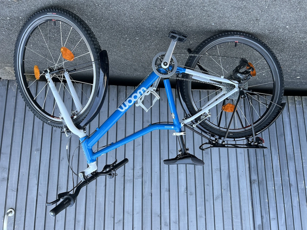 Woom 5, blau   inkl. Racktime Gepäckträger, Korb & SKS Schutzbleche