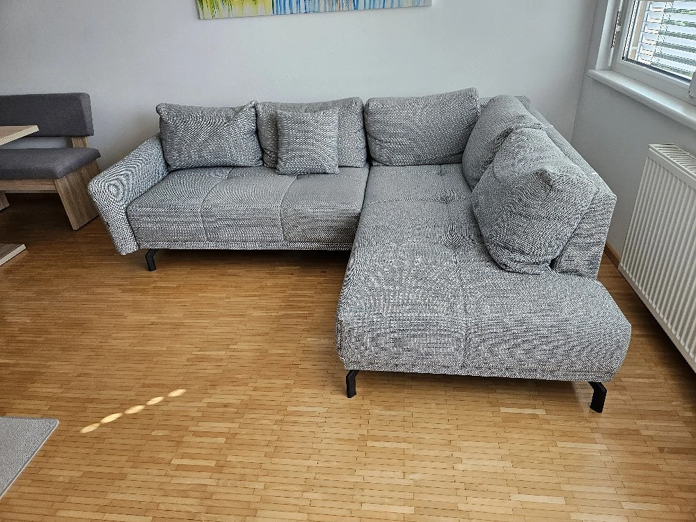 Graues Ecksofa