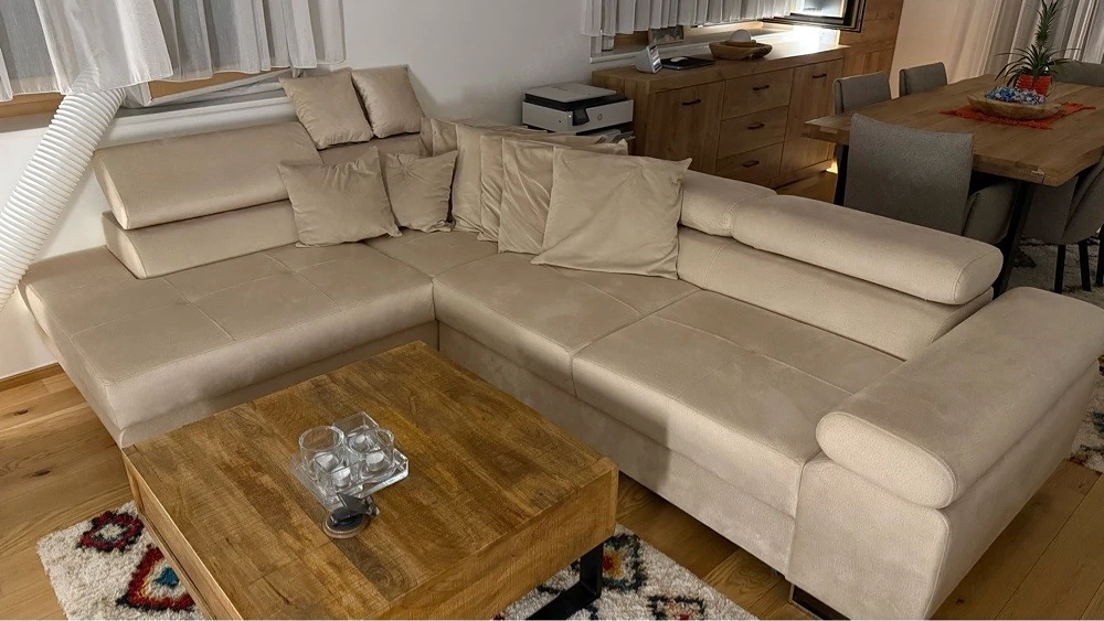 Neuwertiges Ecksofa SELVA L-S - Creme - Bettfunktion & Stauraum