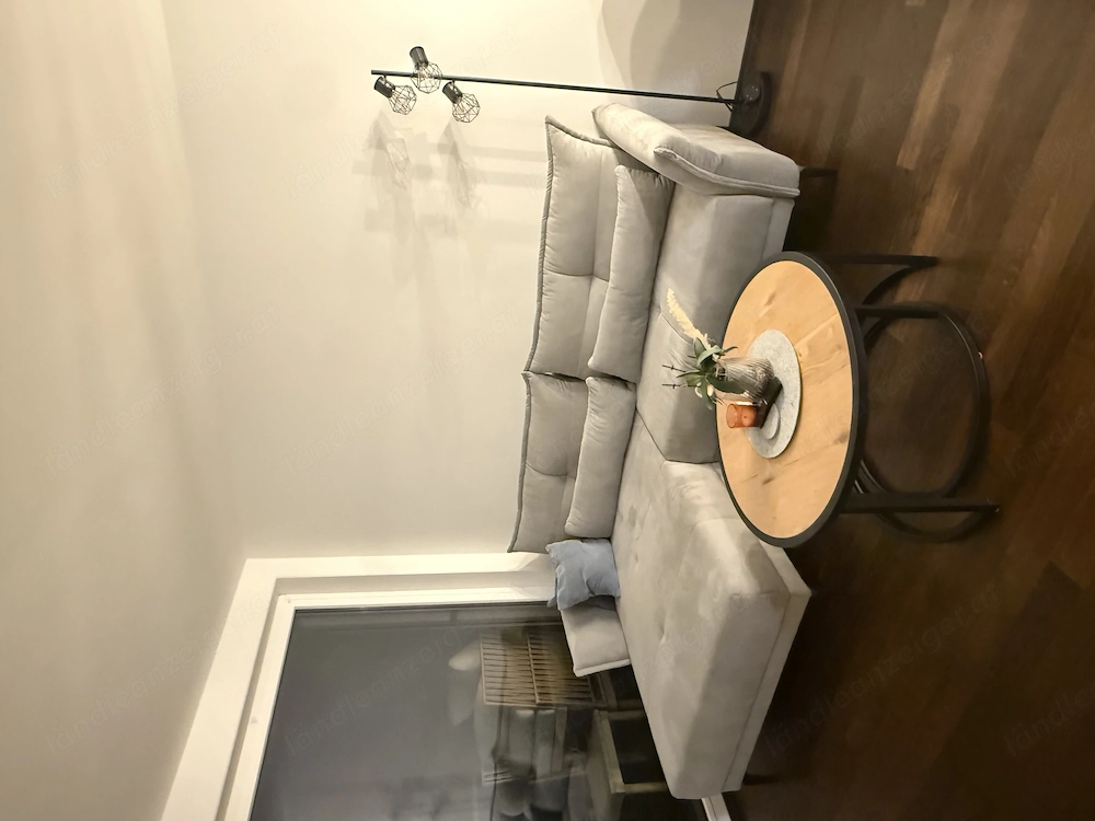 Graue Couch zu verkaufen