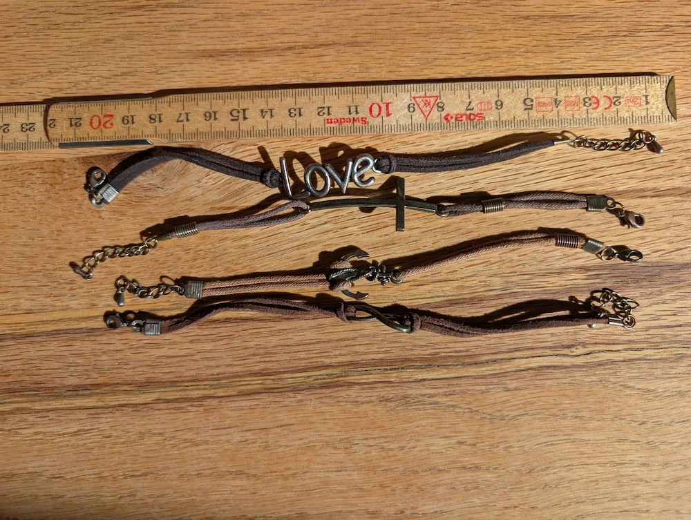 4 Leder Armbänder mit Symbolen Love Kreuz Anker Unendlich