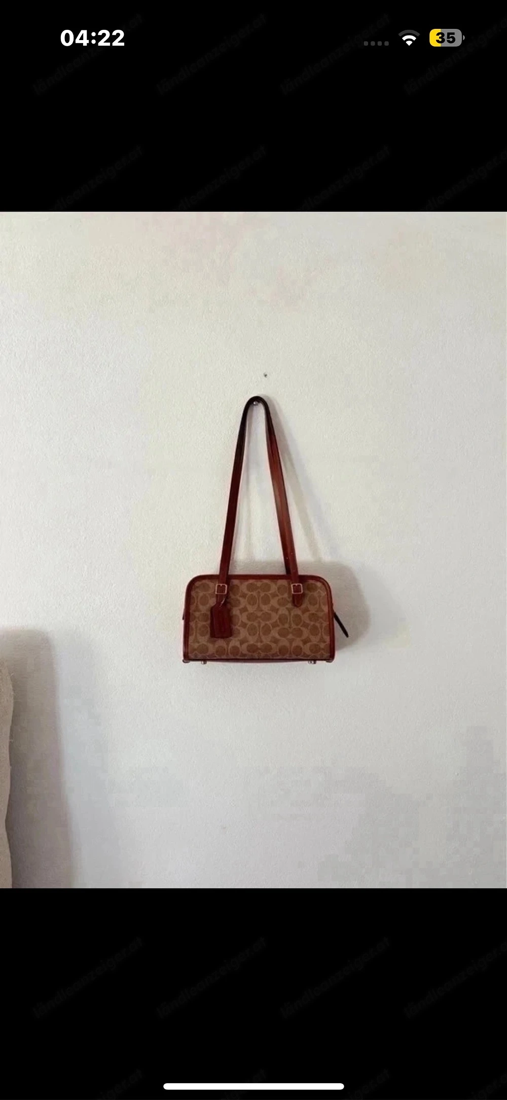 Coach Swing Zip Tasche