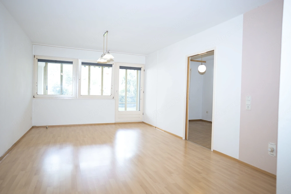 Attraktive Erdgeschosswohnung mit Wintergarten & Grünfläche