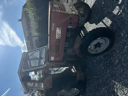 Styer 650 Traktor mit Mulde 