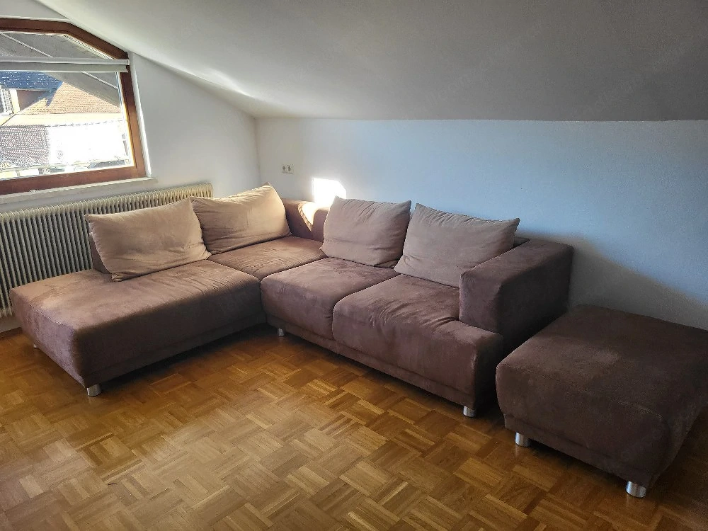 Sofa mit Zusatzhocker