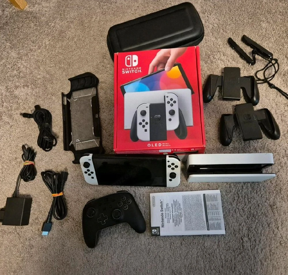 Nintendo Switch Oled mit Pro Controlers+ 16 Spielen