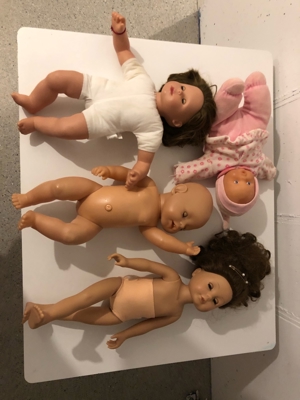Puppen und Kleidung  Bild 1