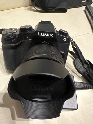 Foto und Filmkamera lumix g Objektiv 12-60 mit Fotobuch Ladegerät und Tragetasche Bild 2
