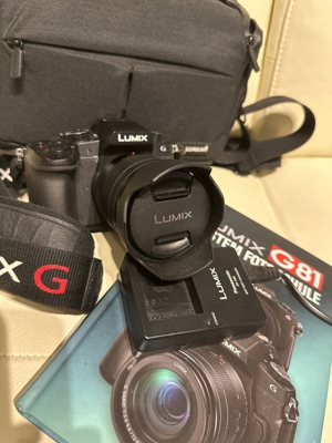 Foto und Filmkamera lumix g Objektiv 12-60 mit Fotobuch Ladegerät und Tragetasche Bild 1