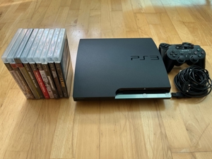 PlayStation 3 Konsole Slim-Edition, 120 GB inkl. 2 Controllern und Spielen Bild 2