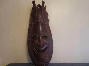 Afrikanische Holzschnitzkunst - Wandmaske - Holz - schwer - massiv - 61,5cm x 23cm Bild 1