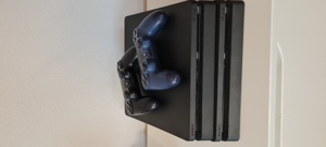 PS 4 mit diversen Spielen Bild 1
