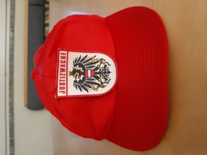 rote Kappe mit Justizwache - Emblem Bild 2
