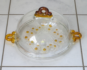 Käseglocke mit Glashaube, Tortenplatte, Servierplatte, Kuchenplatte, Platte gelb   Bild 1