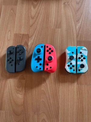 Nintendo Switch-Konsole mit 12 Spielen und viel Zubehör. Bild 2
