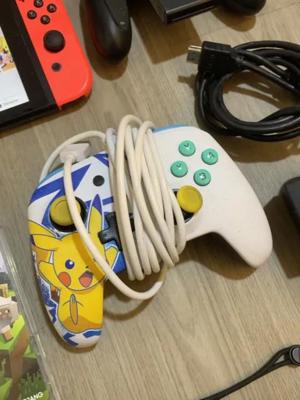 Nintendo Switch + 11 Spiele + Tasche + Pikachu-Controller Bild 3