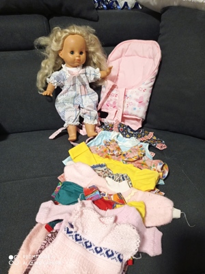 Puppen und Kleidung  Bild 3