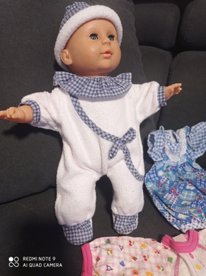 Puppen und Kleidung  Bild 1