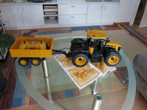 Verkaufe Traktor mit Anhänger Bild 1