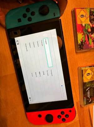 Nintendo switch mit Zubehör und 3 Spiele  Bild 3