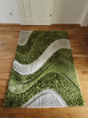 grüner makelloser Teppich 170x120