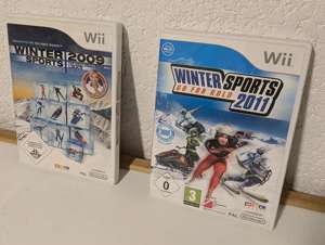 Wii Konsole + zwei Spiele + 3 Lenkräder Bild 4