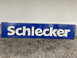 Leuchtschrift SCHLECKER (ehem. Drogeriemarkt) blau weiss Bild 2