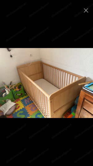 Holzbaby Bett mit Matratze  Bild 2