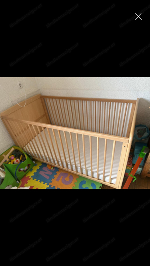 Holzbaby Bett mit Matratze  Bild 3