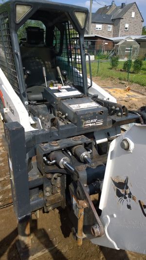 BOBCAT 864 Raupenkompaktlader mit Anbaubagger 730S & Zubehör Bild 9