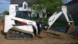 BOBCAT 864 Raupenkompaktlader mit Anbaubagger 730S & Zubehör