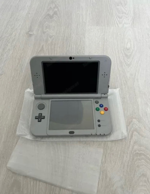 Nintendo 3ds XL Limited Edition SNES in Box mit 5 Spielen Bild 2